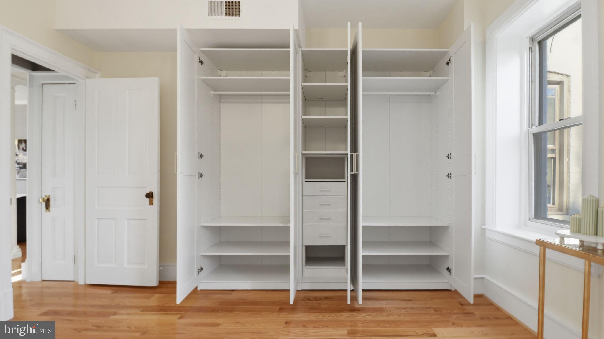 2205 California Street Northwest, Unit 303 Washington, DC 20008 - Photo 24 of 52 a view of walk in closet with empty racks
