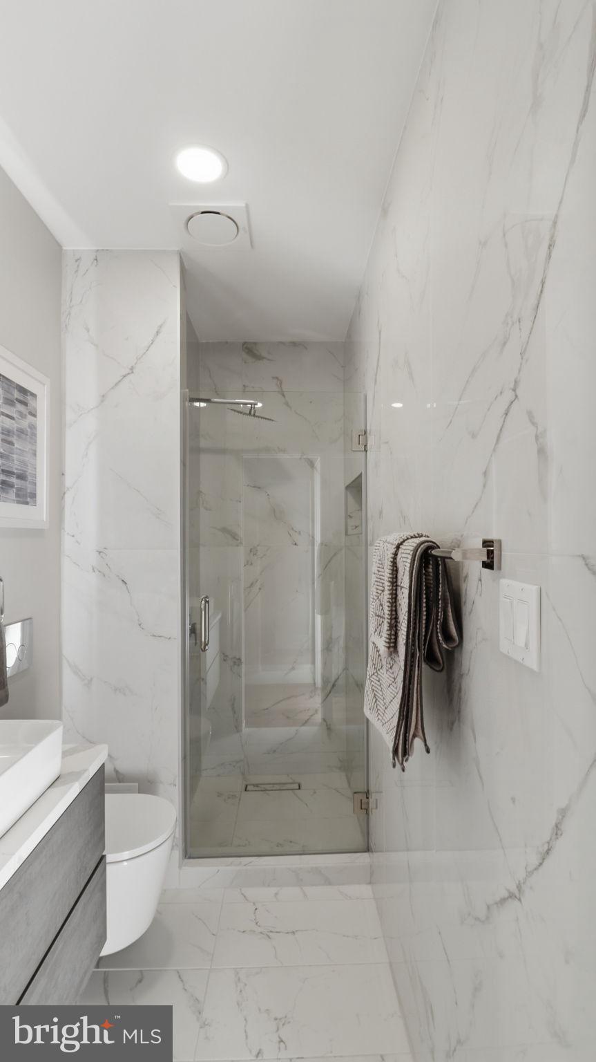 2205 California Street Northwest, Unit 303 Washington, DC 20008 - Photo 27 of 52 a bathroom with a shower
