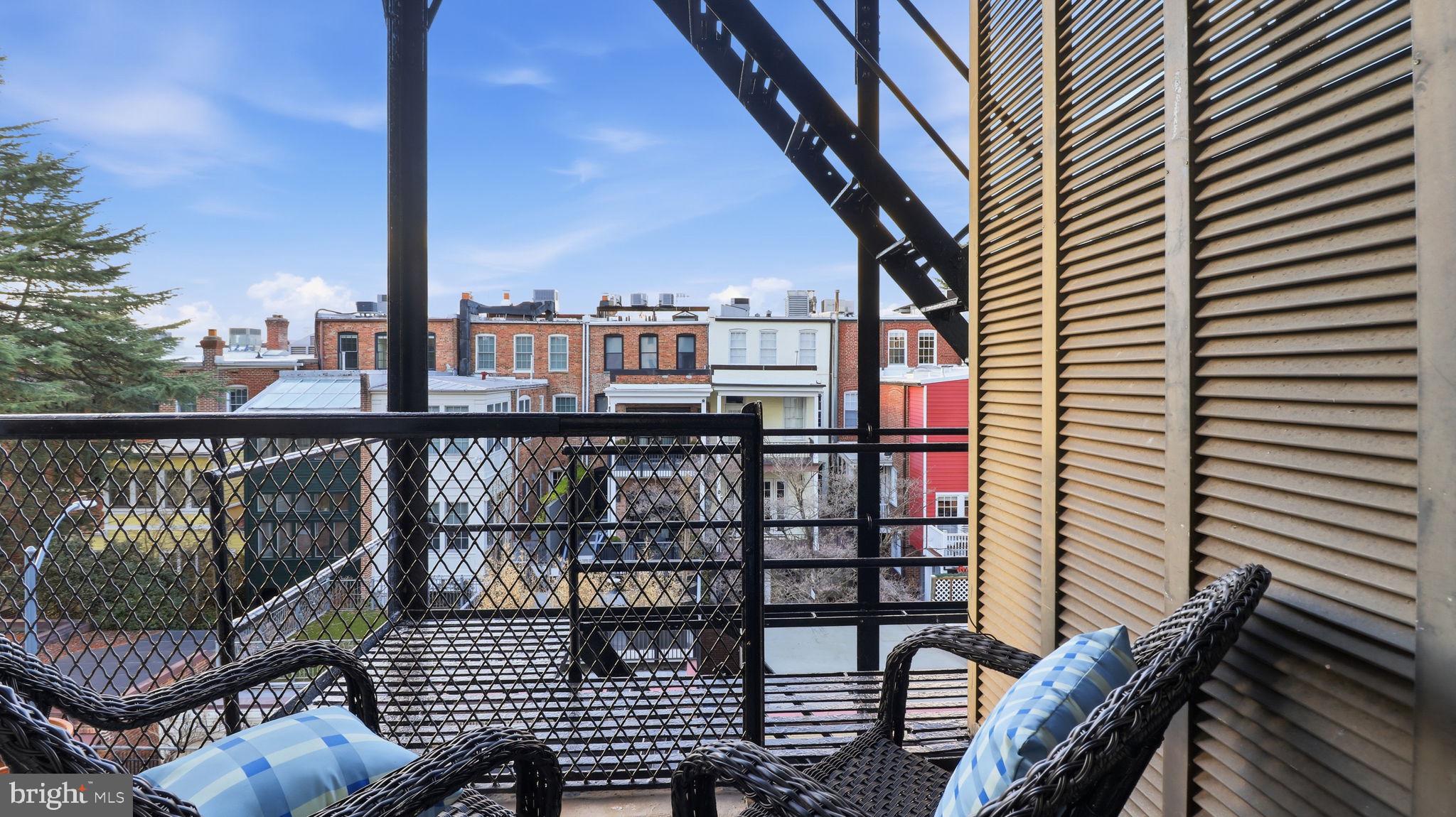 2205 California Street Northwest, Unit 303 Washington, DC 20008 - Photo 35 of 52 a view of a balcony with wooden floor