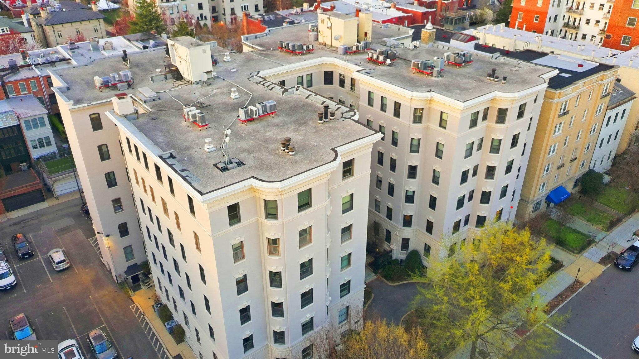 2205 California Street Northwest, Unit 303 Washington, DC 20008 - Photo 52 of 52 a large building with a clock on the wall