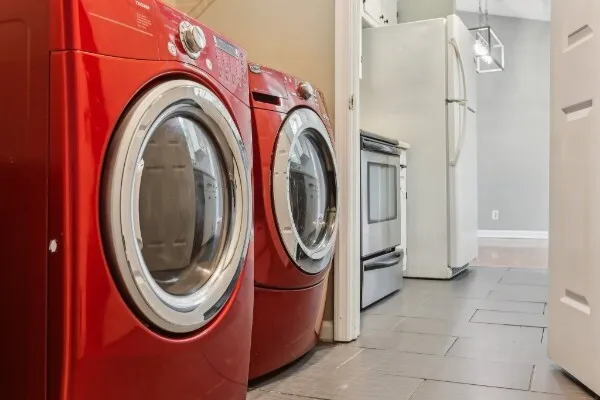 a utility room with dryer and washer