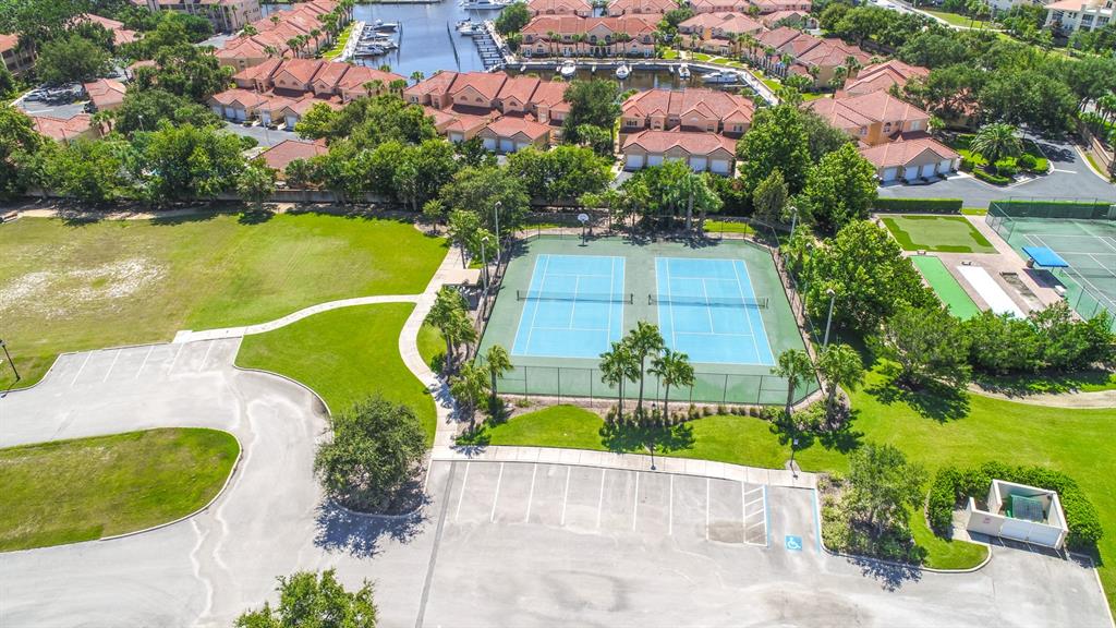 49 Longview Way North Palm Coast, FL 32137 - Photo 40 of 43 an aerial view of a house with a swimming pool yard and lake view