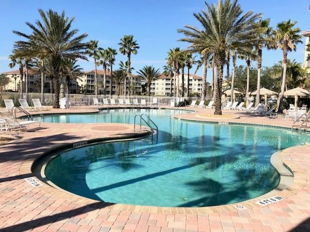 49 Longview Way North Palm Coast, FL 32137 - Photo 41 of 43 a view of a swimming pool with a patio