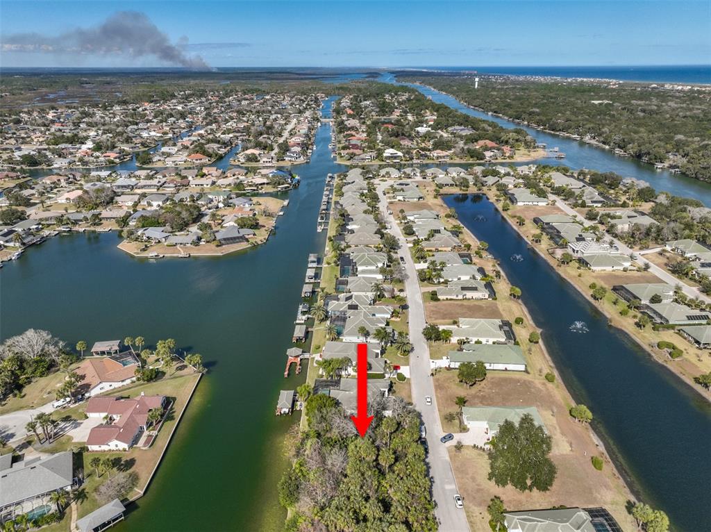 49 Longview Way North Palm Coast, FL 32137 - Photo 9 of 43 an aerial view of residential houses with outdoor space