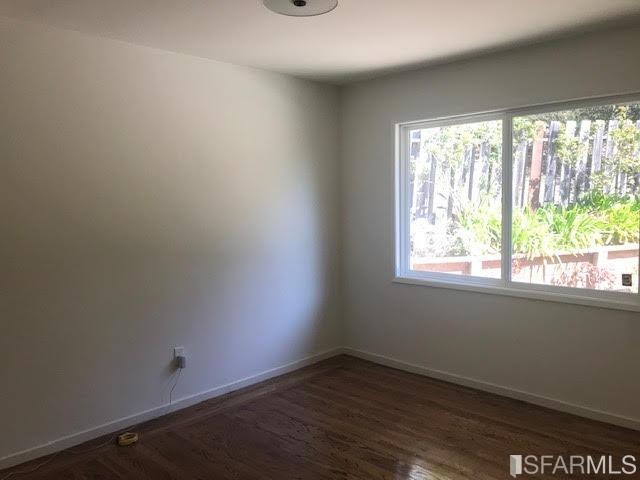 2 Oriole Road Orinda, CA 94563 - Photo 13 of 22 an empty room with wooden floor and windows