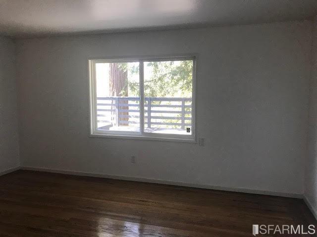 2 Oriole Road Orinda, CA 94563 - Photo 10 of 22 a view of an empty room with wooden floor and a window