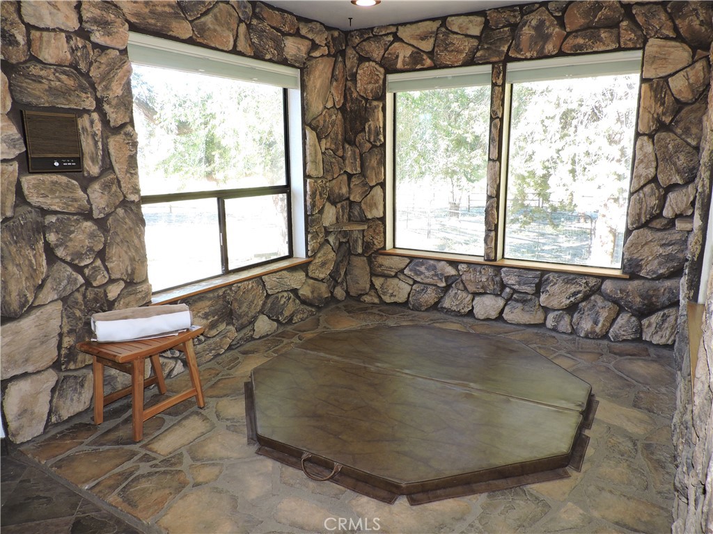 26931 Columbia Way Tehachapi, CA 93561 - Photo 48 of 49 Unique indoor spa in Primary Bathroom! Plenty of windows yet private with amazing views. What a wonderful way to end the day!