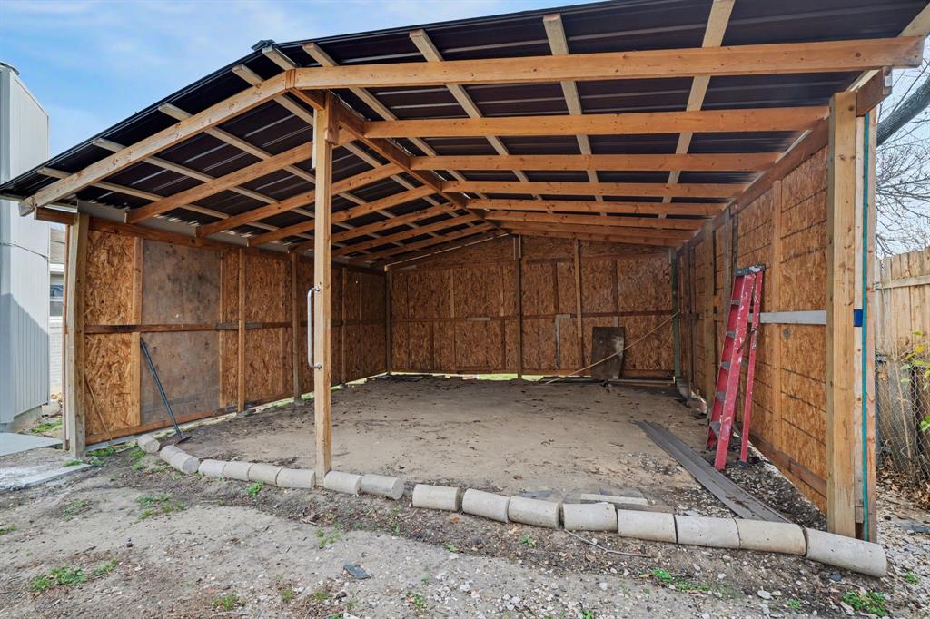 1714 East Union Bower Road Irving, TX 75061 - Photo 29 of 32 a view of empty room with wooden walls