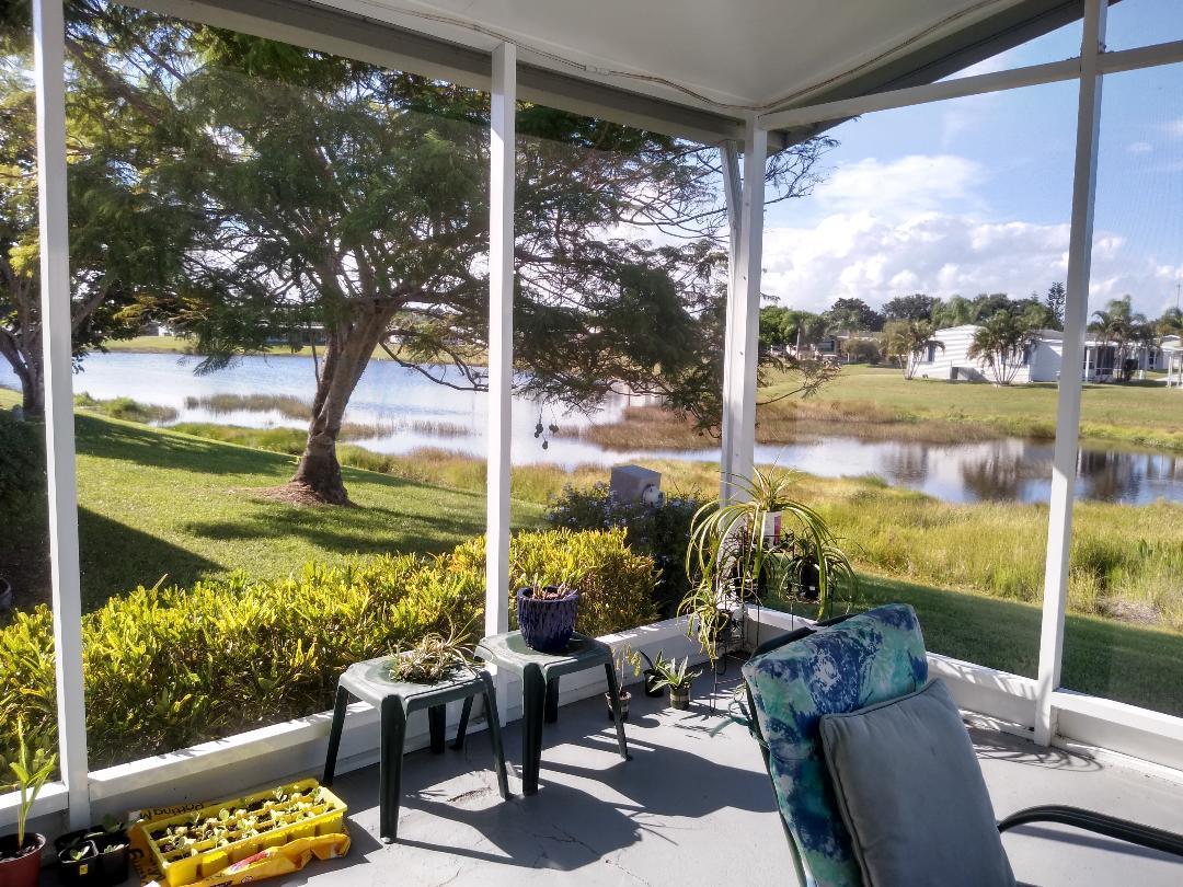 504 Thames Bluff Ridge Fort Pierce, FL 34982 - Photo 9 of 35 View of Lake from Back Porch