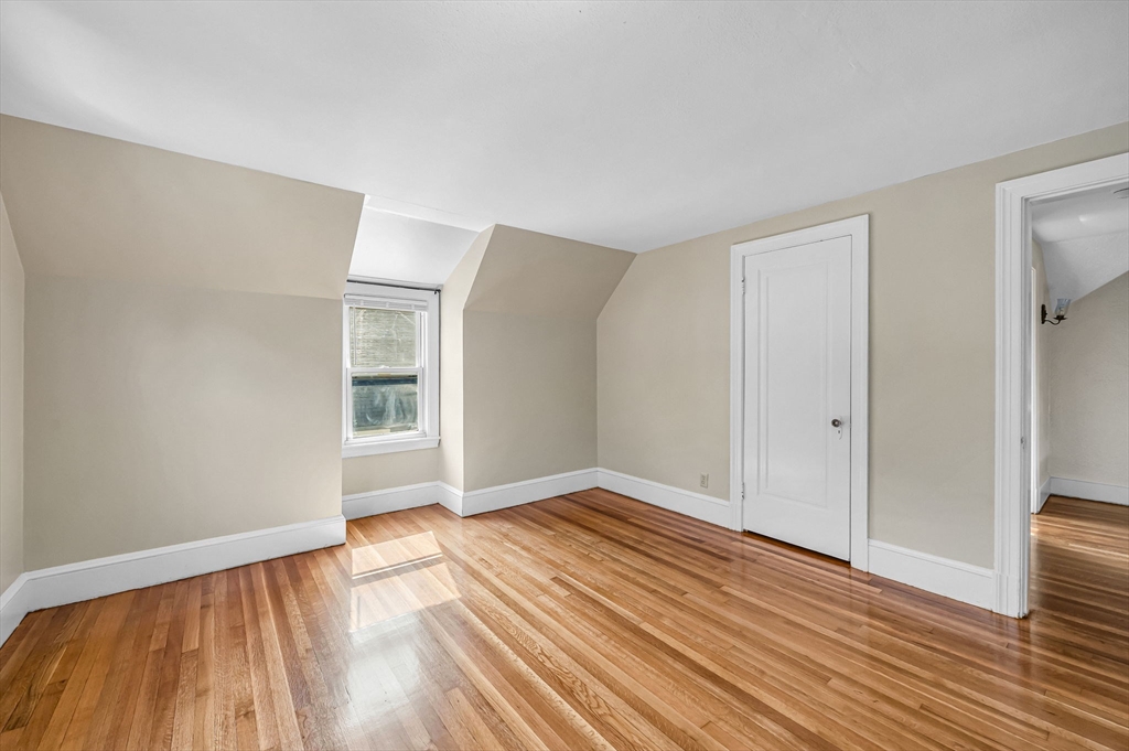 33 Emerson Road Longmeadow, MA 01106 - Photo 28 of 42 a view of an empty room with wooden floor and a window