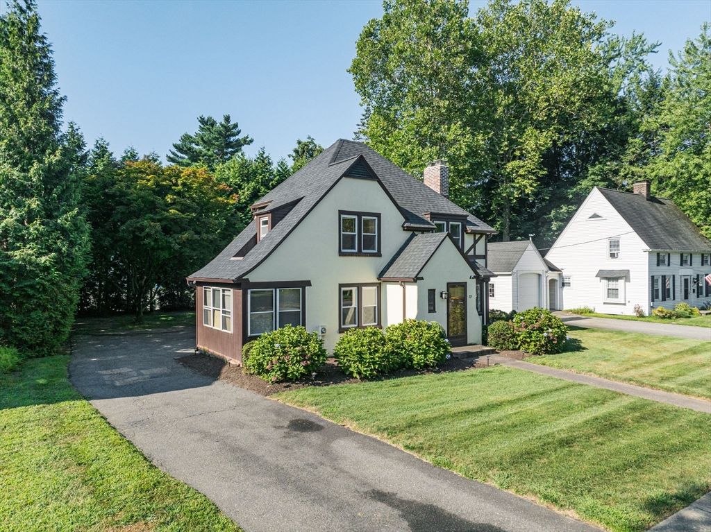 33 Emerson Road Longmeadow, MA 01106 - Photo 36 of 42 a front view of a house with a yard