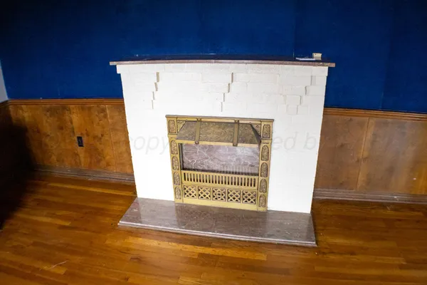 a view of a door with wooden floor