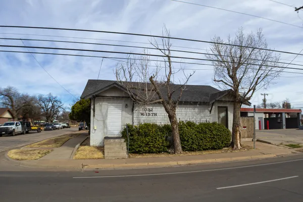 a view of a house with a street