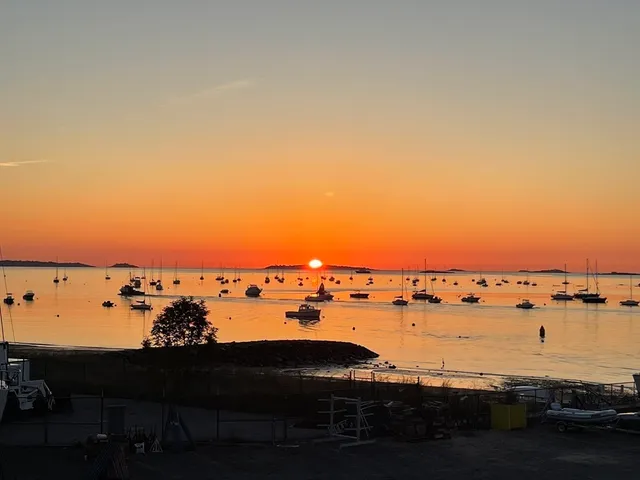 a view of ocean with boats