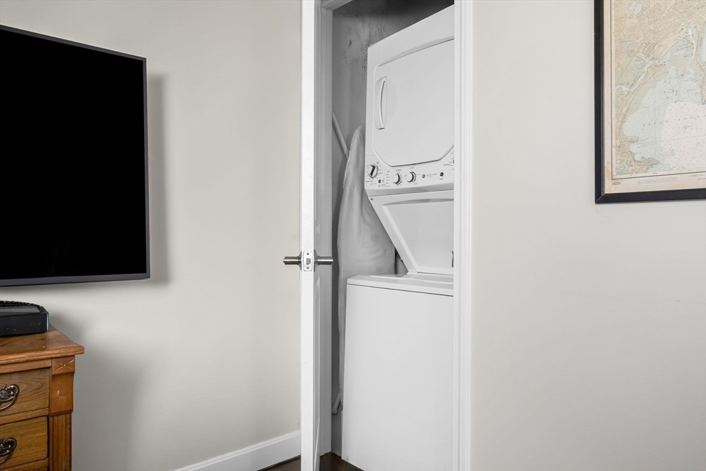 117 Water Street, Unit 28 Beverly, MA 01915 - Photo 30 of 35 a utility room with dryer and washer