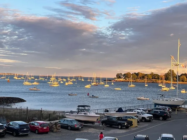 a view of parking with cars parked