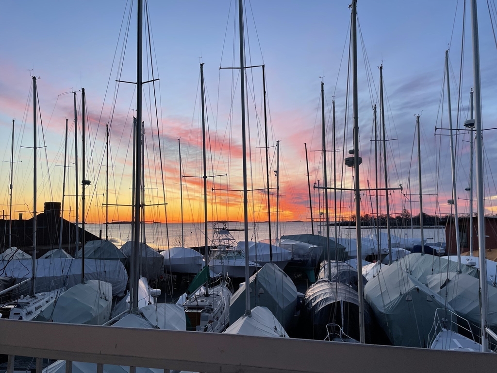 117 Water Street, Unit 28 Beverly, MA 01915 - Photo 33 of 35 a living room with furniture and large windows