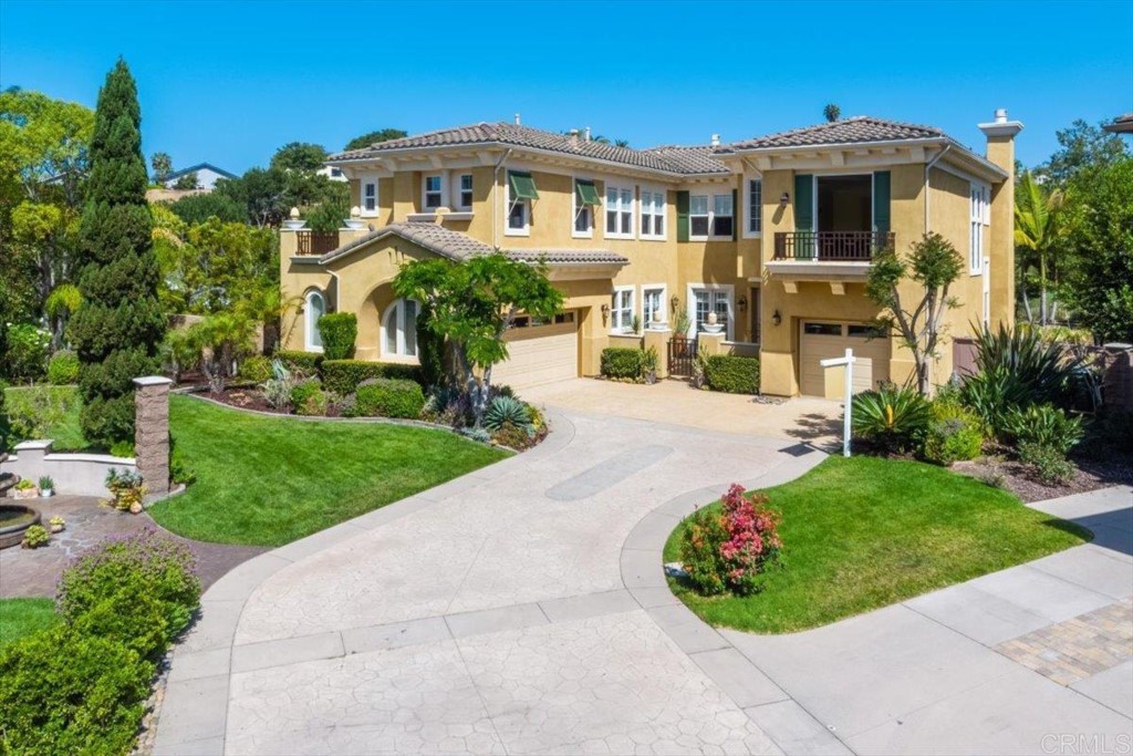 1306 Ravean Court Encinitas, CA 92024 - Photo 1 of 1 a front view of a house with a garden
