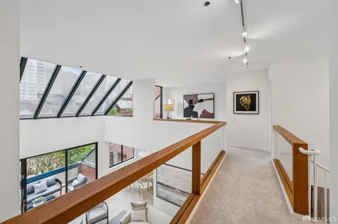 view of living room with furniture and floor to ceiling window