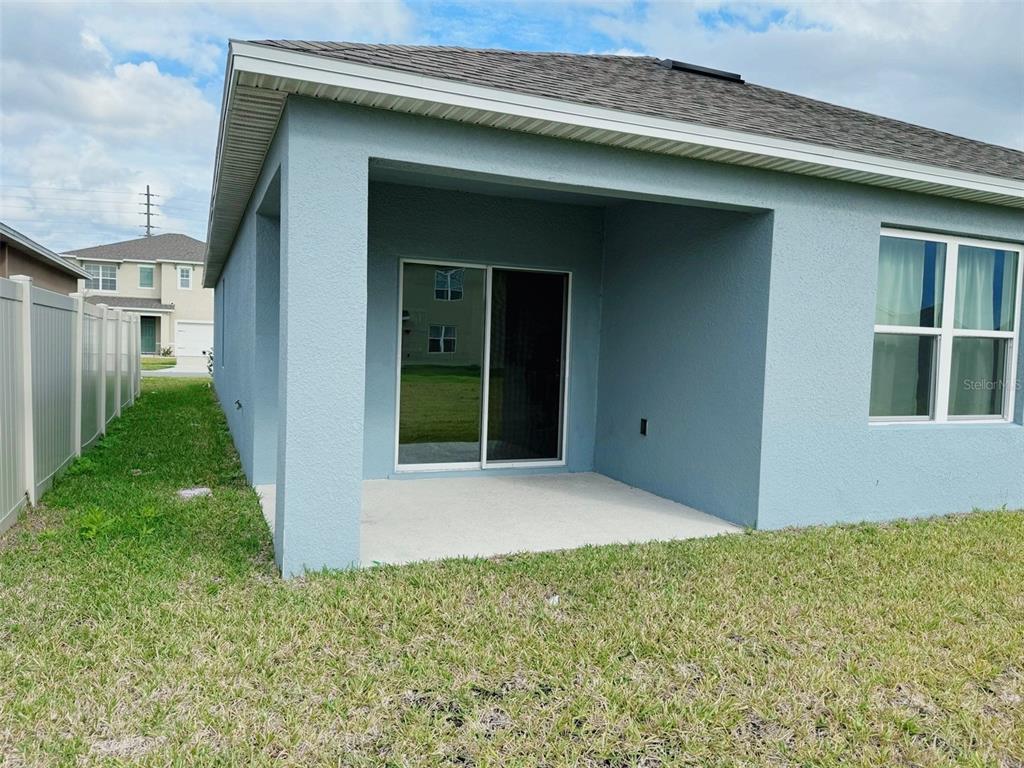 569 Talisi Loop St. Cloud, FL 34771 - Photo 19 of 20 a view of an entrance of the house