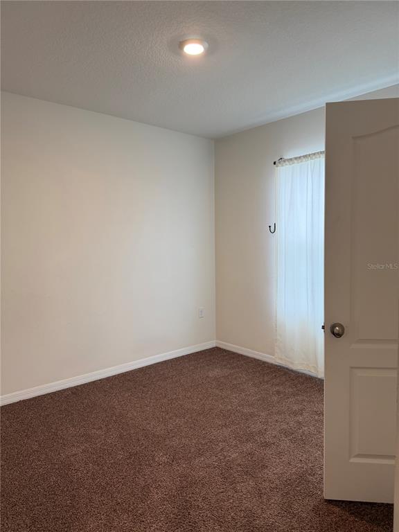 569 Talisi Loop St. Cloud, FL 34771 - Photo 9 of 20 a view of an empty room
