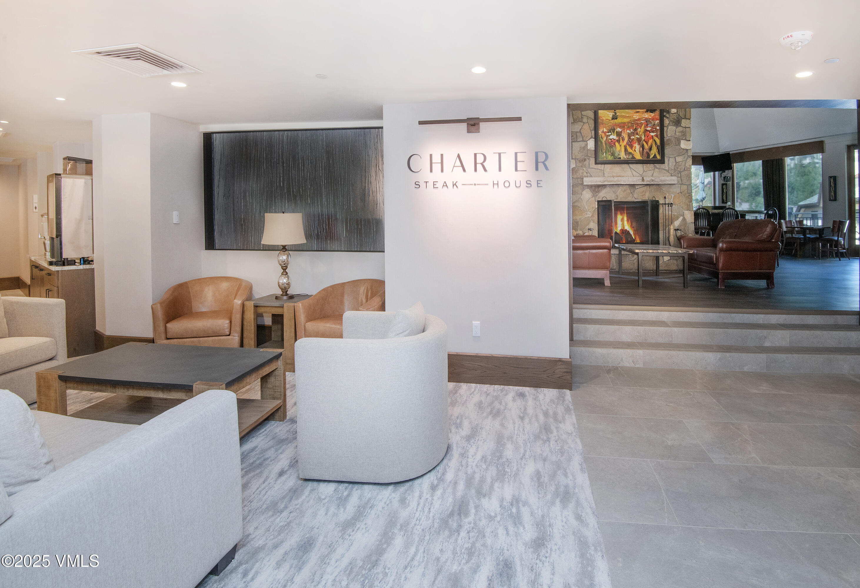 120 Offerson Road, Unit 6140 Beaver Creek, CO 81620 - Photo 31 of 38 a living room with furniture and a flat screen tv