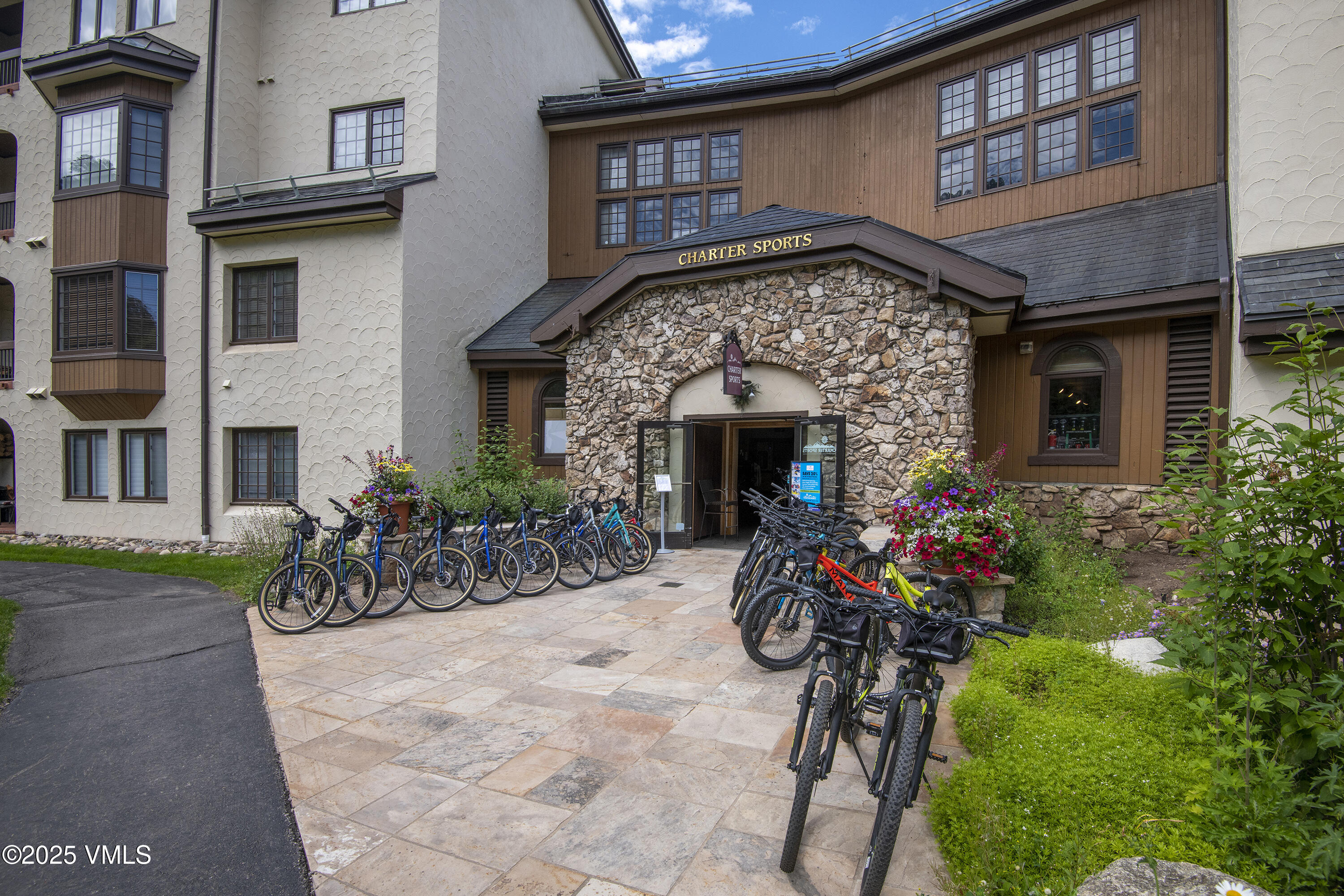 120 Offerson Road, Unit 6140 Beaver Creek, CO 81620 - Photo 35 of 38 a front view of a house with a yard