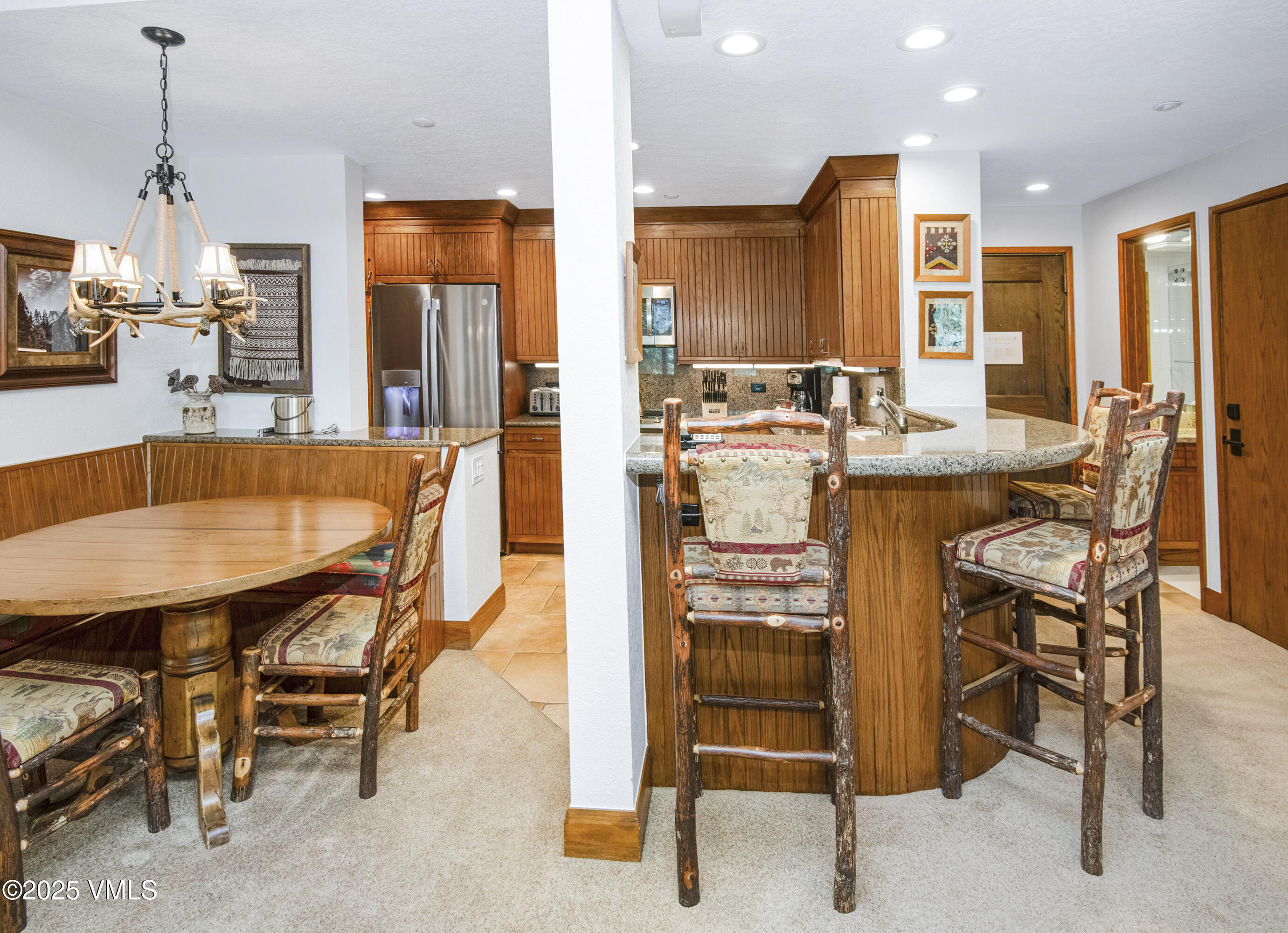 120 Offerson Road, Unit 6140 Beaver Creek, CO 81620 - Photo 10 of 38 a view of a dining room with furniture