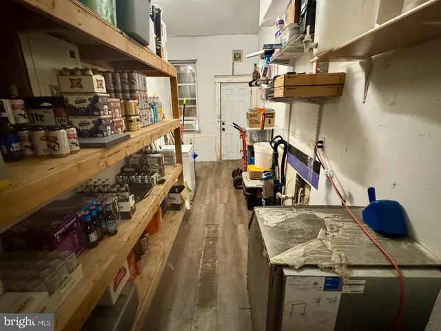 a kitchen with stainless steel appliances granite countertop a stove and a refrigerator