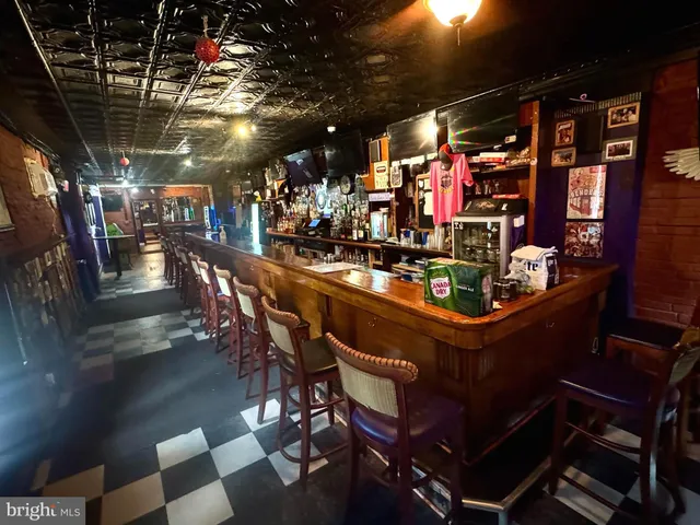 a view of a chairs and tables in patio