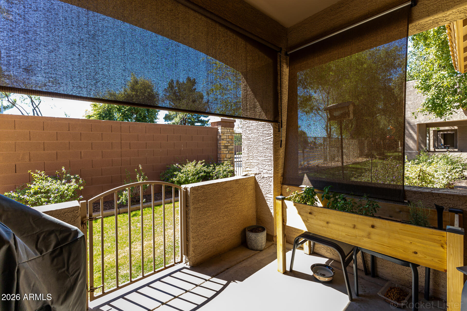 2600 East Springfield Place, Unit 109 Chandler, AZ 85286 - Photo 27 of 38 a view of a balcony with chairs
