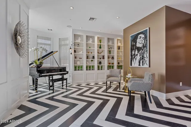 a kitchen with stainless steel appliances granite countertop a stove and a refrigerator