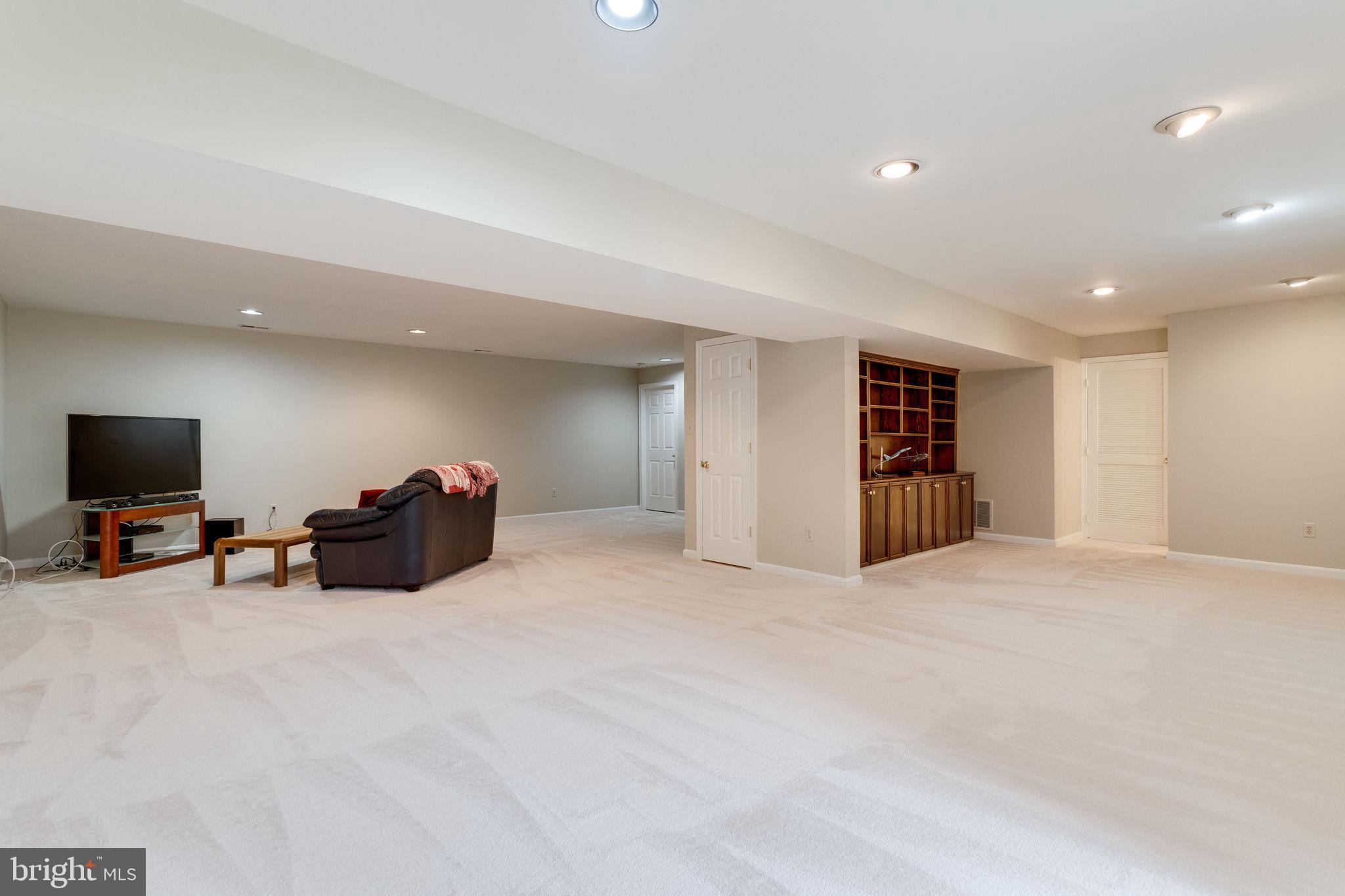 8548 Hooes Road Springfield, VA 22153 - Photo 42 of 53 Huge Rec Room with New Plush Carpet Throughout
