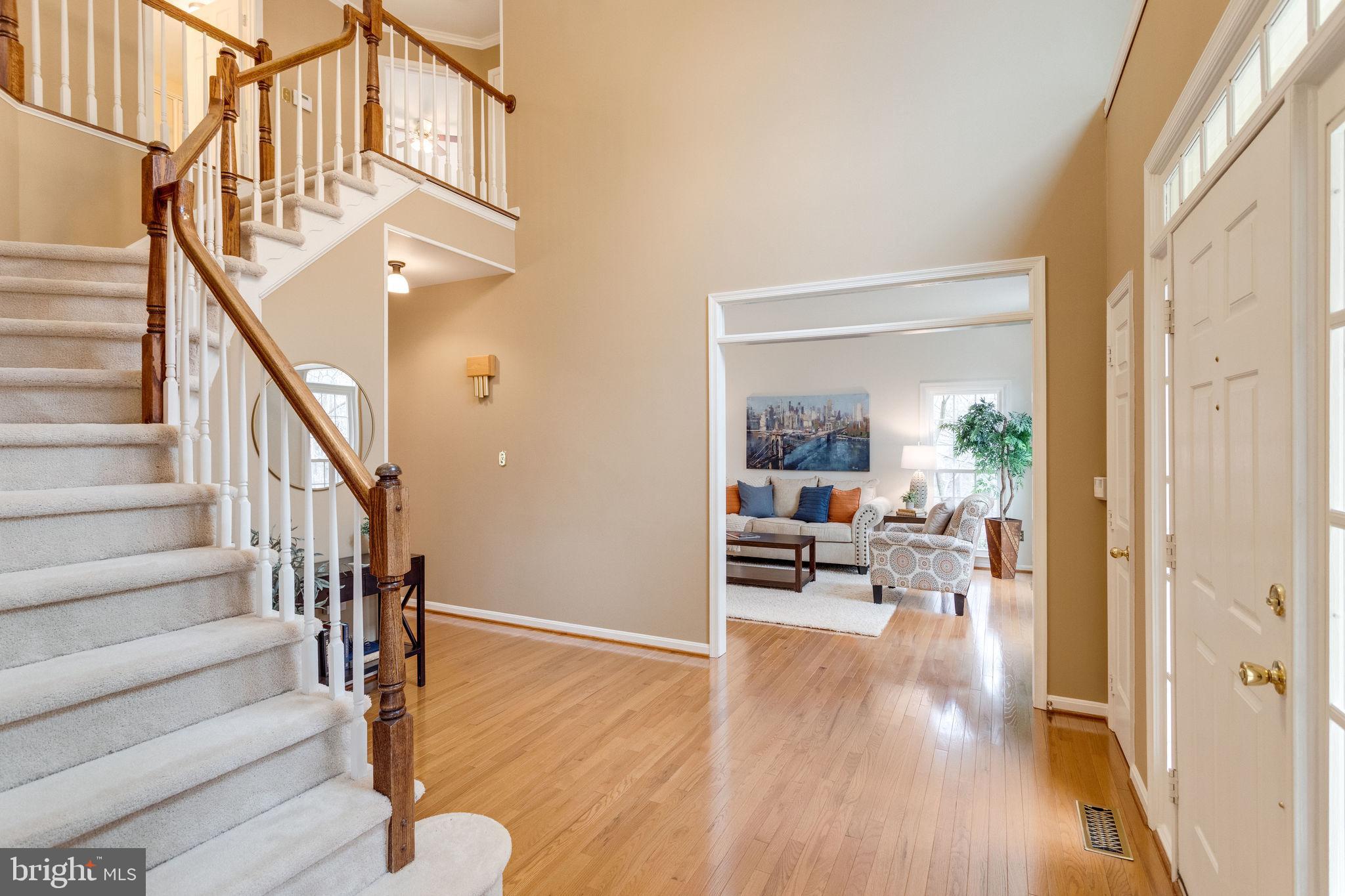 8548 Hooes Road Springfield, VA 22153 - Photo 6 of 53 Large Center Hall Foyer with Hardwood Floors