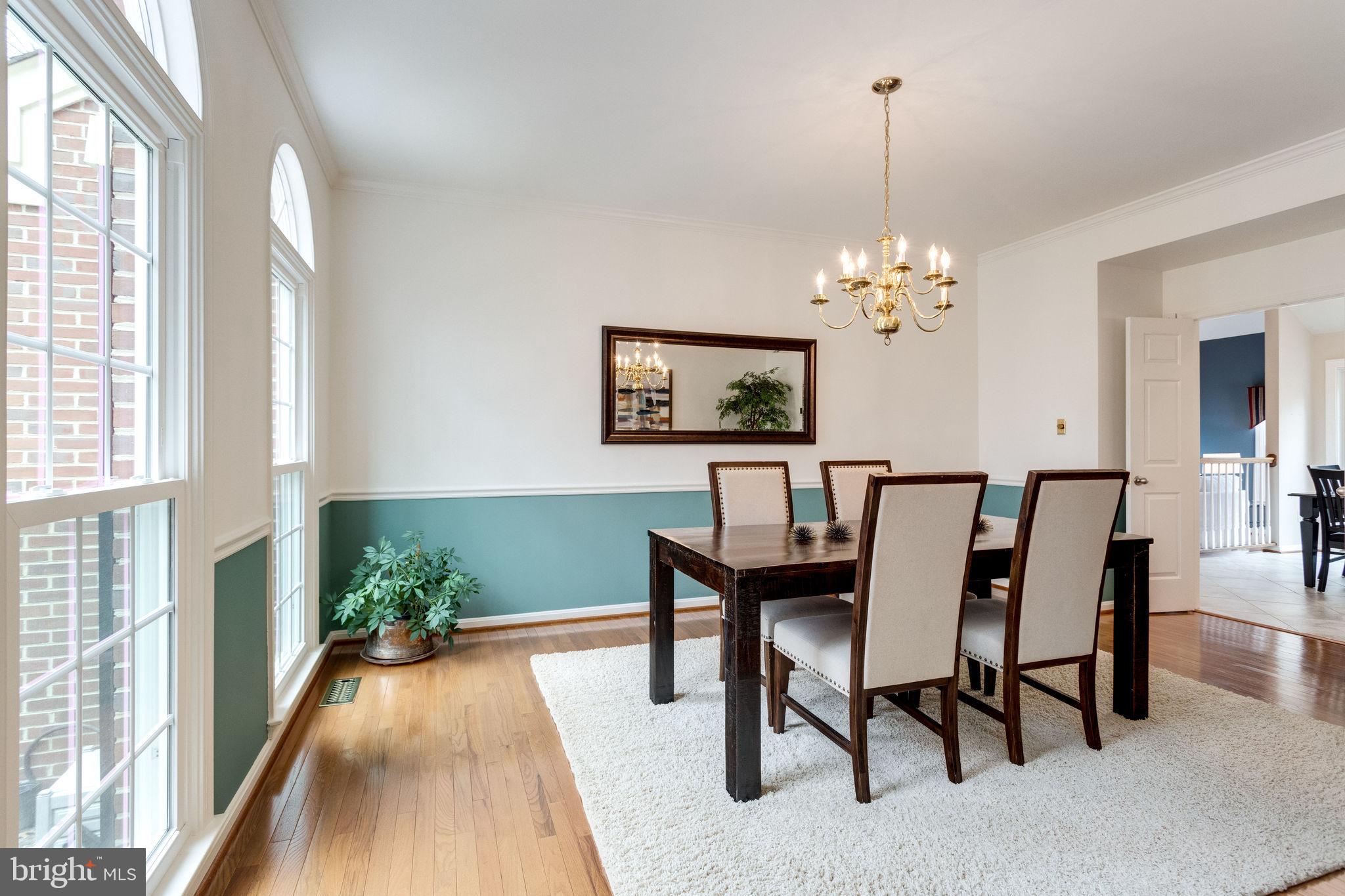 8548 Hooes Road Springfield, VA 22153 - Photo 10 of 53 Formal Dining Room with Chair Rail & Crown Molding