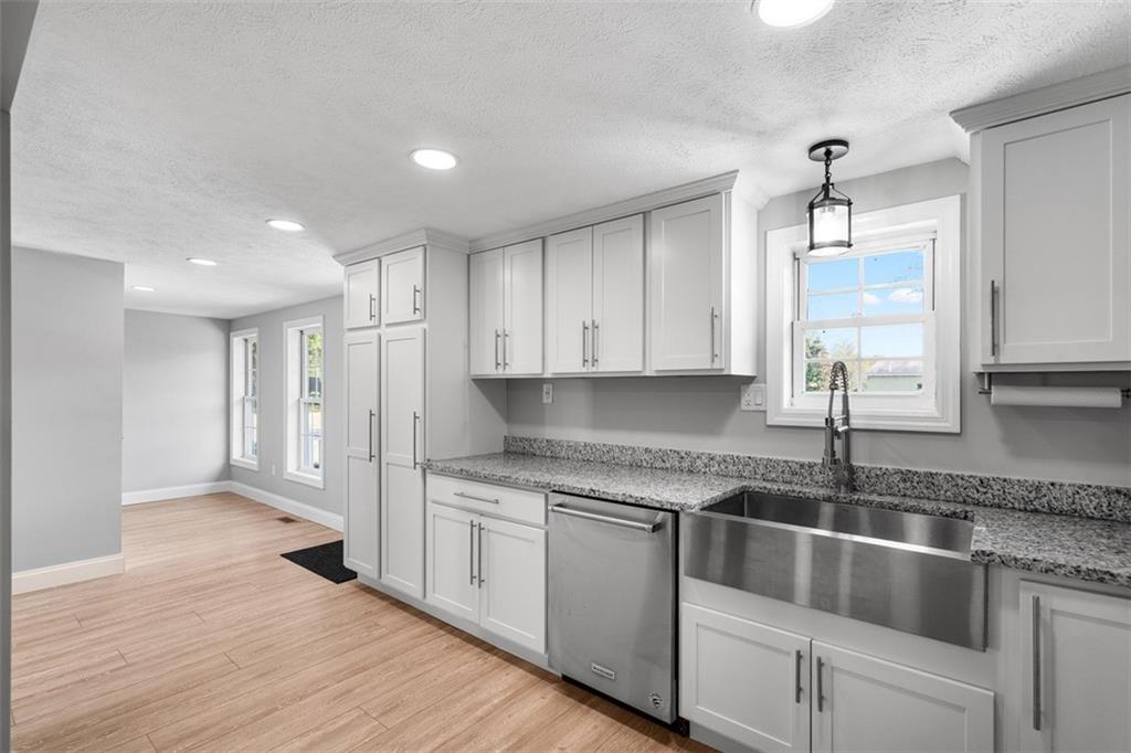 428 Weimer Road Leechburg, PA 15656 - Photo 15 of 42 a kitchen with granite countertop a sink and cabinets