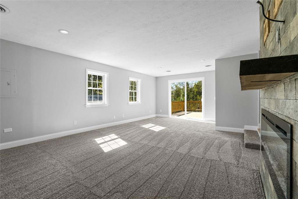 428 Weimer Road Leechburg, PA 15656 - Photo 17 of 42 a view of empty room with fireplace and window