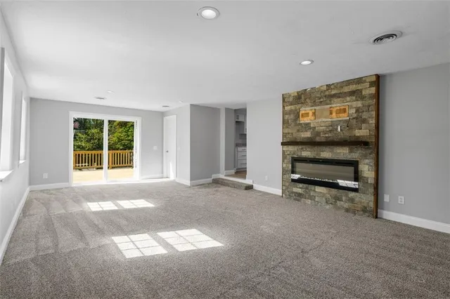 a view of balcony with deck and wooden floor