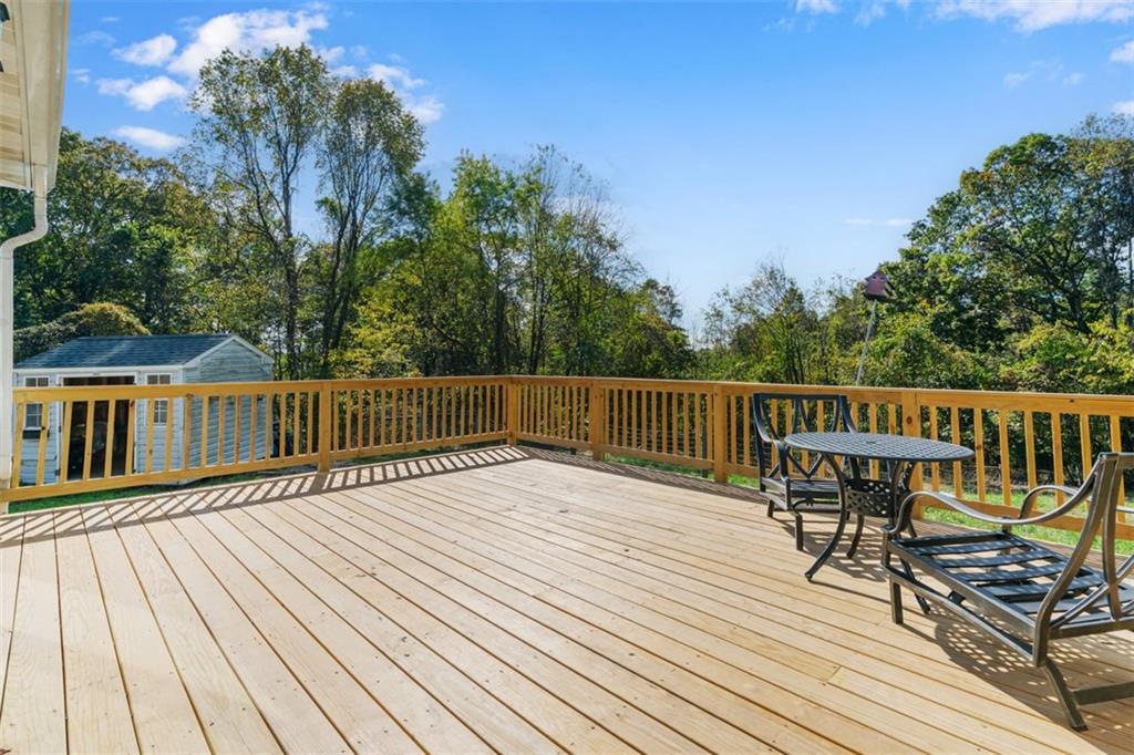 428 Weimer Road Leechburg, PA 15656 - Photo 20 of 42 a balcony with wooden floor and fence