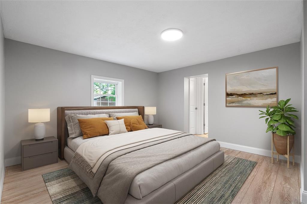 428 Weimer Road Leechburg, PA 15656 - Photo 23 of 42 a bedroom with a bed and a potted plant