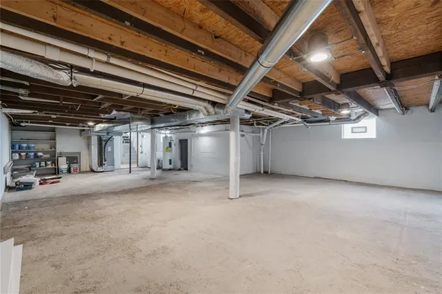 a view of a forest with a lake