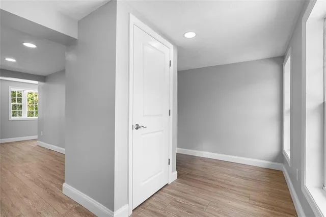 a kitchen with stainless steel appliances a refrigerator and a stove top oven