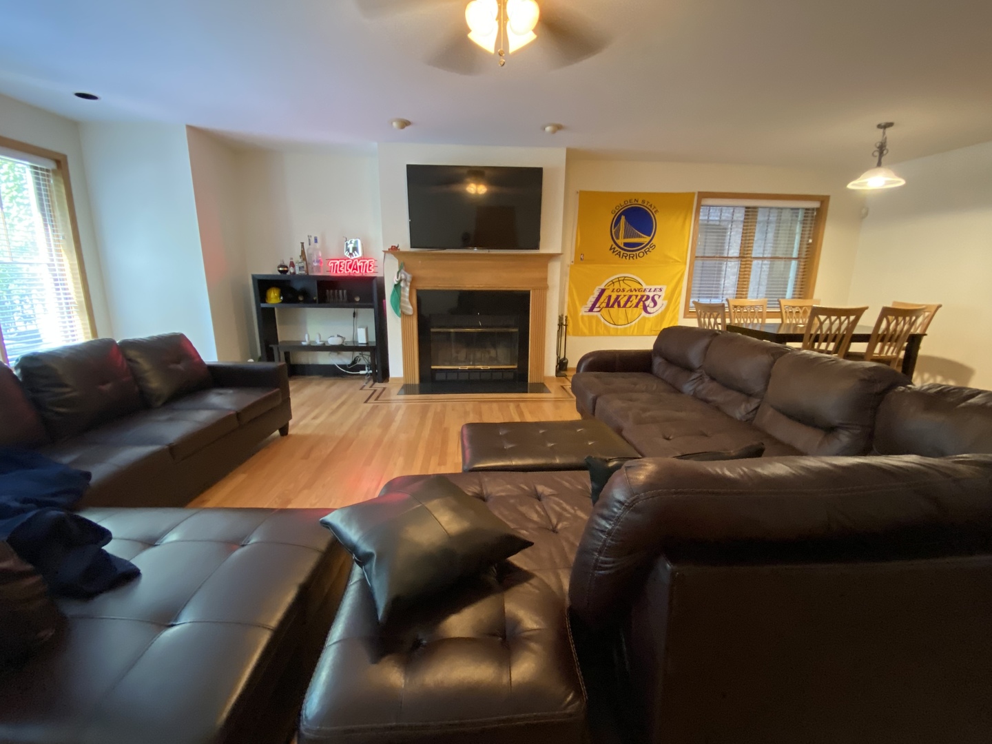 654 West Briar Place, Unit G Chicago, IL 60657 - Photo 6 of 17 a living room with furniture a flat screen tv and a fireplace