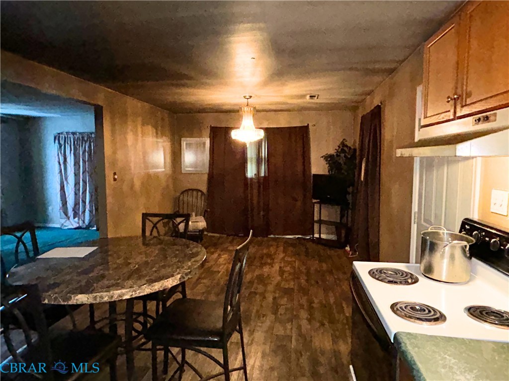 449 Gaskins Road Weems, VA 22576 - Photo 1 of 10 a view of a dining room with furniture