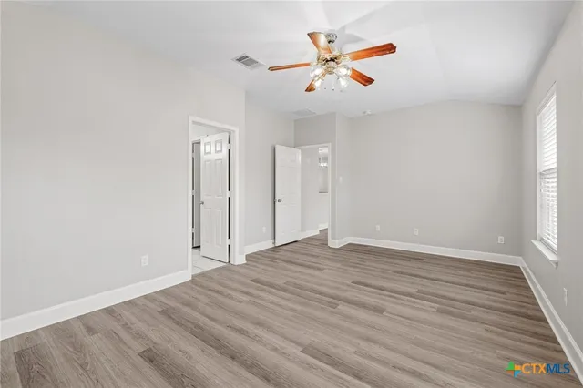 a view of an empty walk in closet