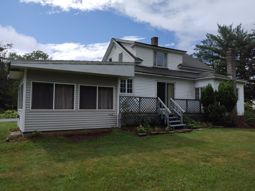 107 Wheelwright Road Barre, MA 01005 - Photo 3 of 15 a view of a house with a yard