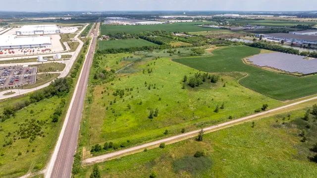 a view of swimming pool from a balcony