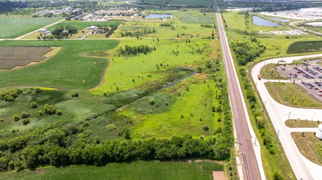 a view of a garden from a balcony