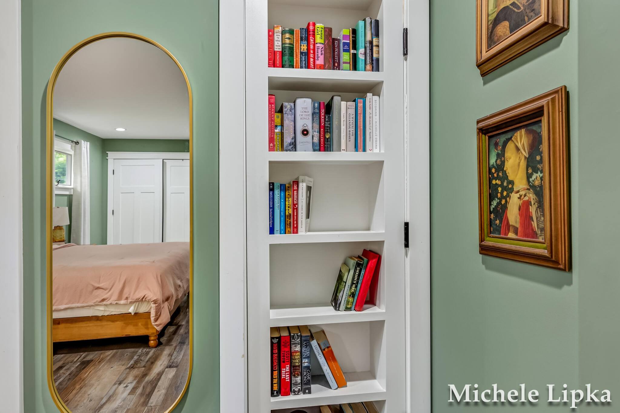 2567 Shettler Road Muskegon, MI 49444 - Photo 19 of 38 Primary Bedroom Opening Bookcase