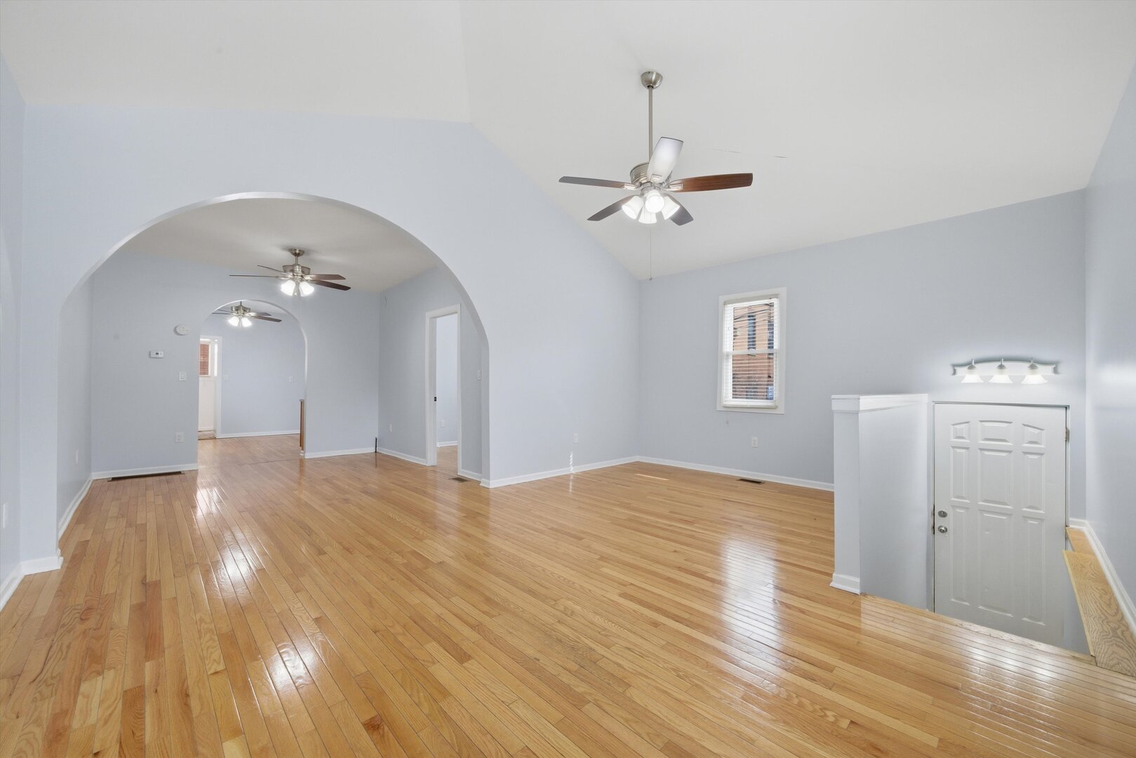 2125 West 18th Place, Unit 5 Chicago, IL 60608 - Photo 2 of 23 a view of empty room with wooden floor